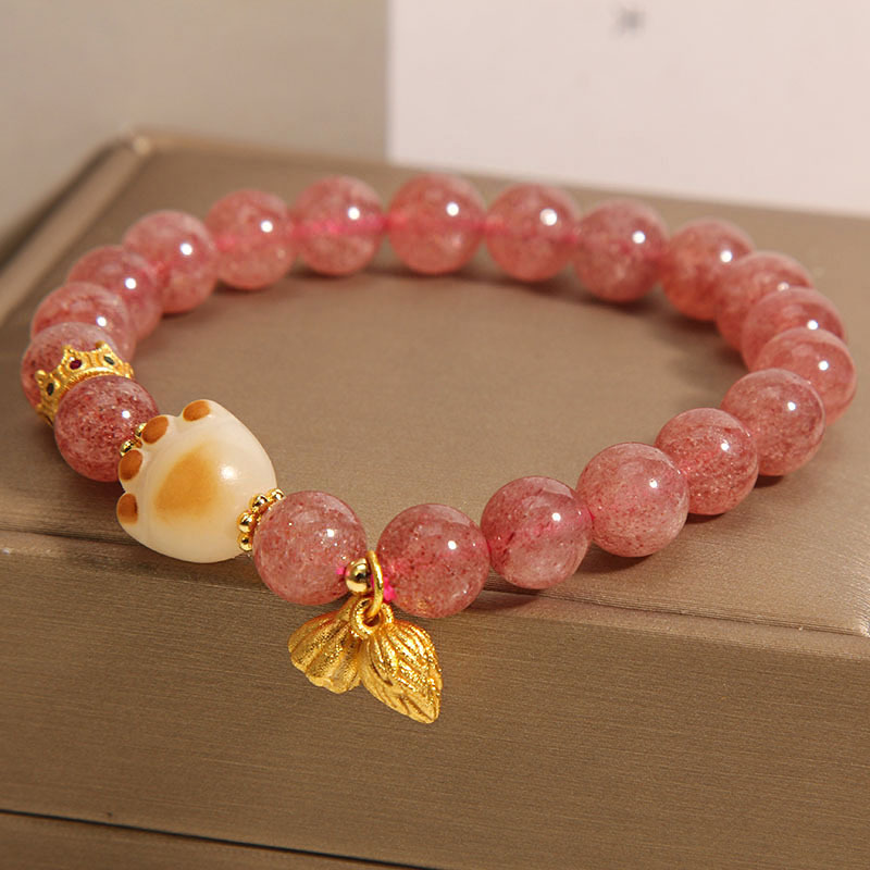 Pulseras de cristal de fresa rosa para mujeres lujosas delicadas y dulces colgantes de loto de nicho para regalar a la novia