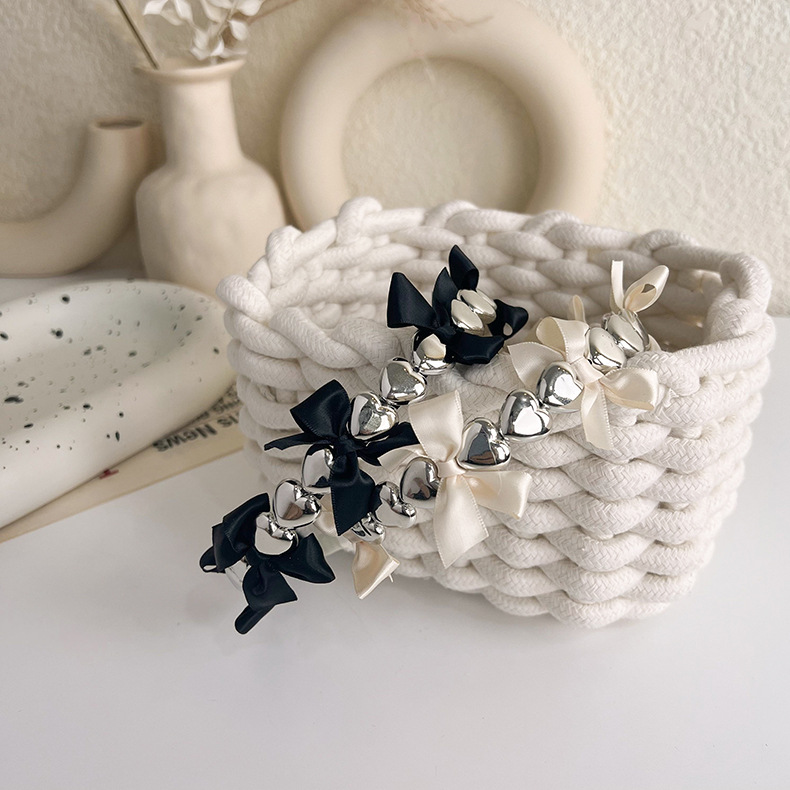Korean Three-dimensional Metal Heart Bow Ribbon Simple Thin Hairband Wholesale display picture 4