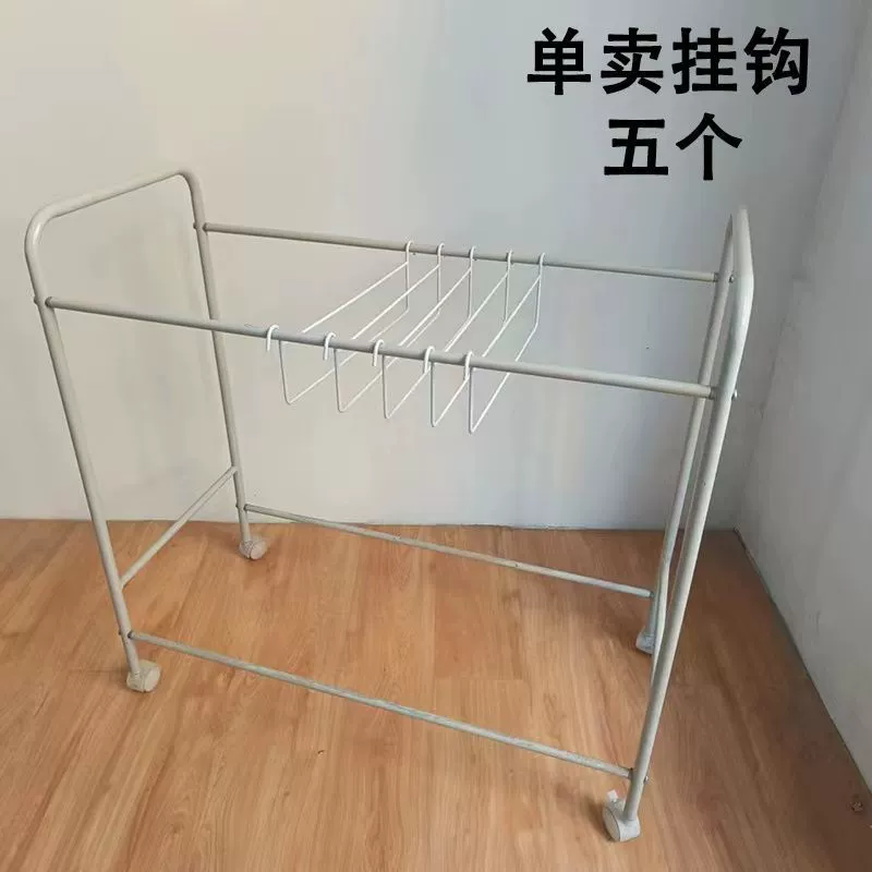 Trousers, storage system, drying rack