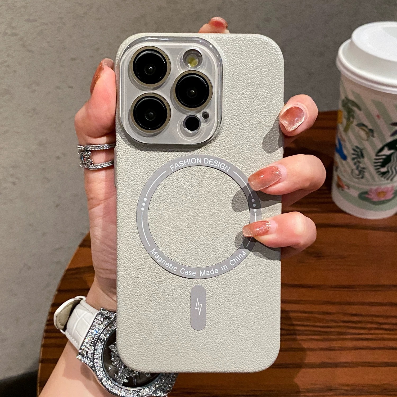 Aperición magnética de patrón de lichi de color sólido para Apple 16promax funda para teléfono móvil iPhone14/13 lente película 15P pareja