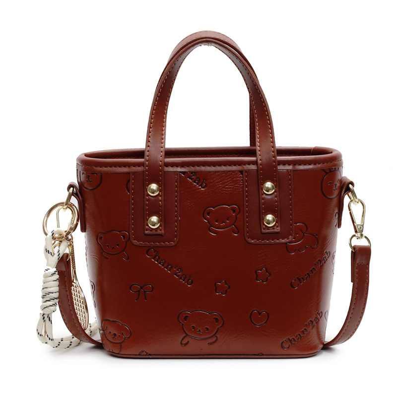 Bolsa de cubo para mujeres 2025 nueva moda versátil bolso de hombro de mano de alta calidad nicho de diseño de mochila de mujer