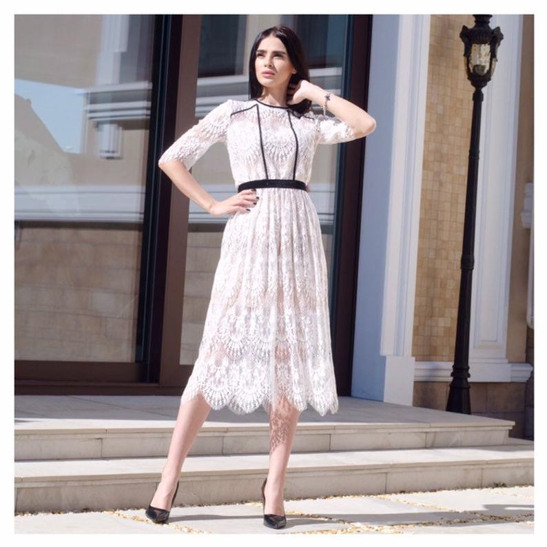 Primavera europea y americana y verano Comercio exterior nueva ropa de mujer 2 Amazon cuello redondo Vestido de manga media vestido delgado de longitud media