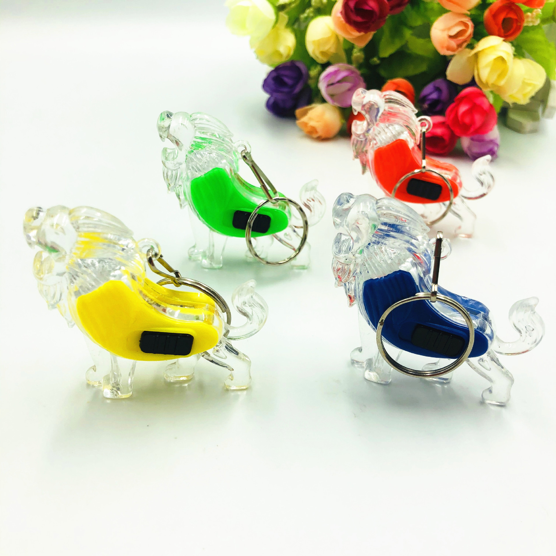 León luminoso transfronterizo LED llavero colgante creativo juguete luminoso para niños un yuan pequeño regalo logotipo imprimible