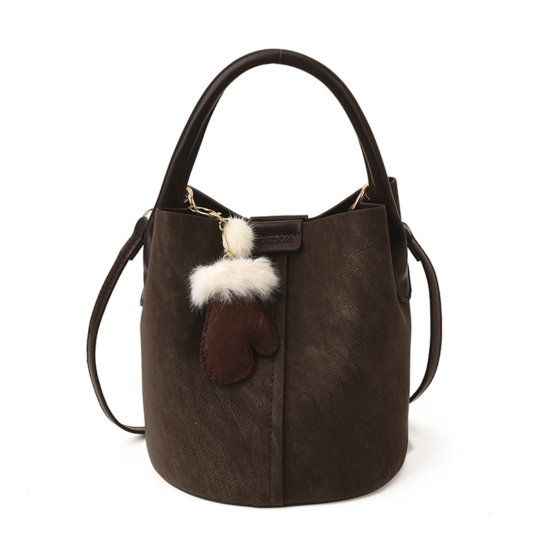 Bagos de cubo de mano de alta sensación de 2025 nuevo retro de hombro de una mujer bolso de alta sensación de bolso de mujer