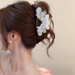 フランス式の優雅な花びらはデンマークの同じタイプの高級感のヘアピンの女性の後頭部のヘアピンの髪飾りのサメの髪飾りを挟みます。
