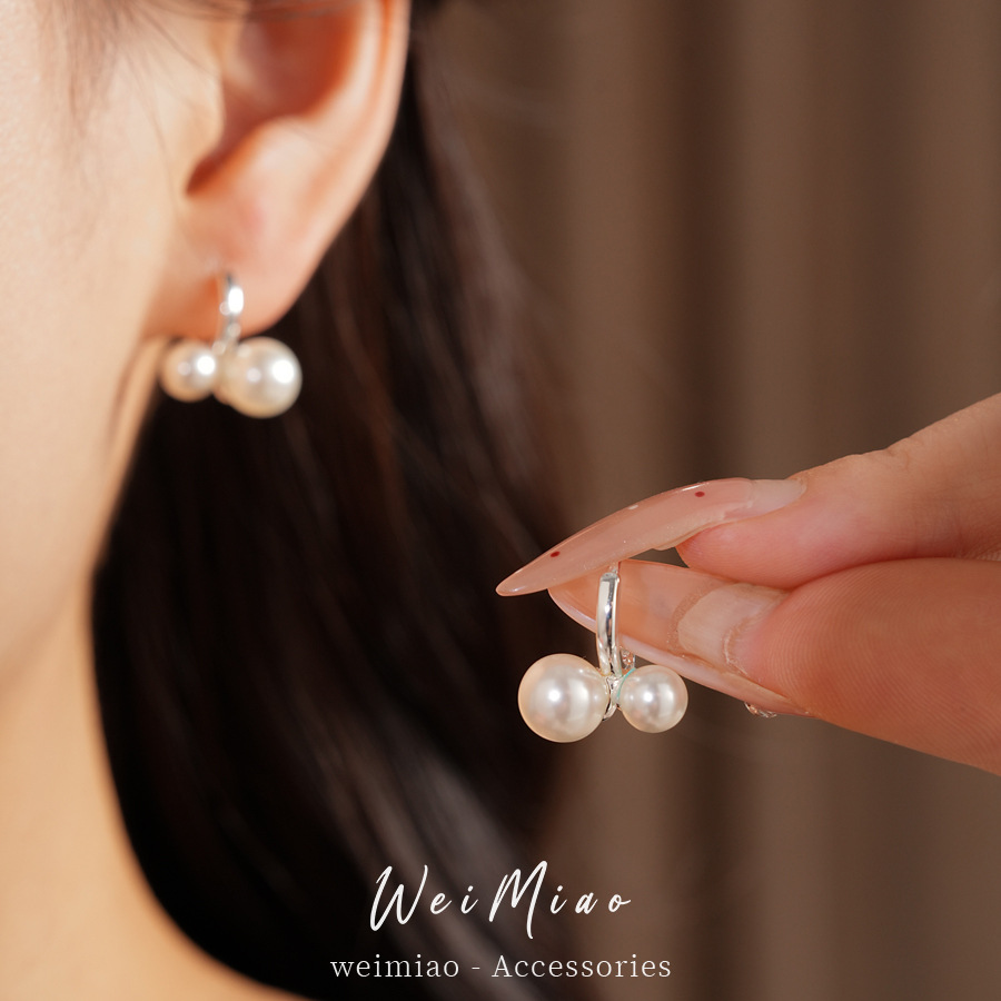 Elegante simple geometría perla aretes de perlas redondas temperamento frío aretes de aretes ligeros de lujo alta sensación de aretes al por mayor
