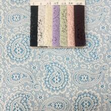 爆款抓毛涤纶蕾丝面料腰果花弹力蕾丝布料跨境卷布连衣裙面料蕾丝