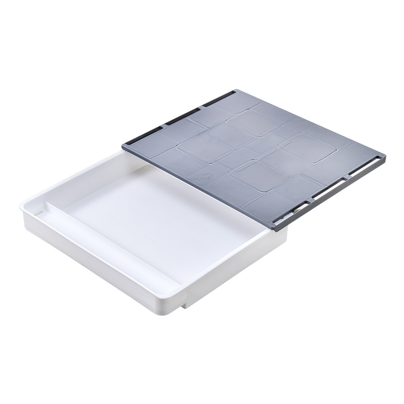 机の下の見えない引き出し式のデスクトップの収納箱の事務文房具の物置棚を整理して机のステーションを整理して収納箱を隠します。