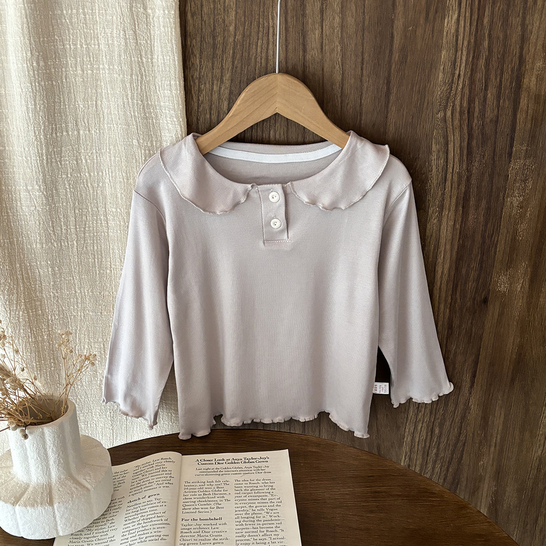 Camiseta de base para niñas delgada estilo extranjero 2025 primavera y otoño nuevo bebé femenino en una sola camiseta de manga larga con solapa de lana 6 años de edad
