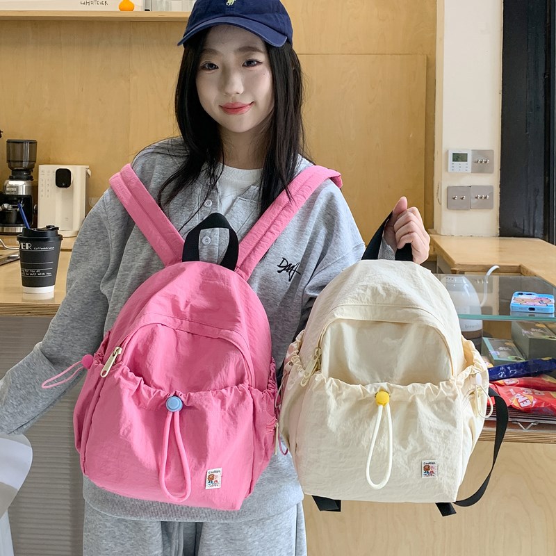 2026 New Simple Couple Backpack Student School Bag Travel Lightweight Waterproof Commuting Bag Unisex