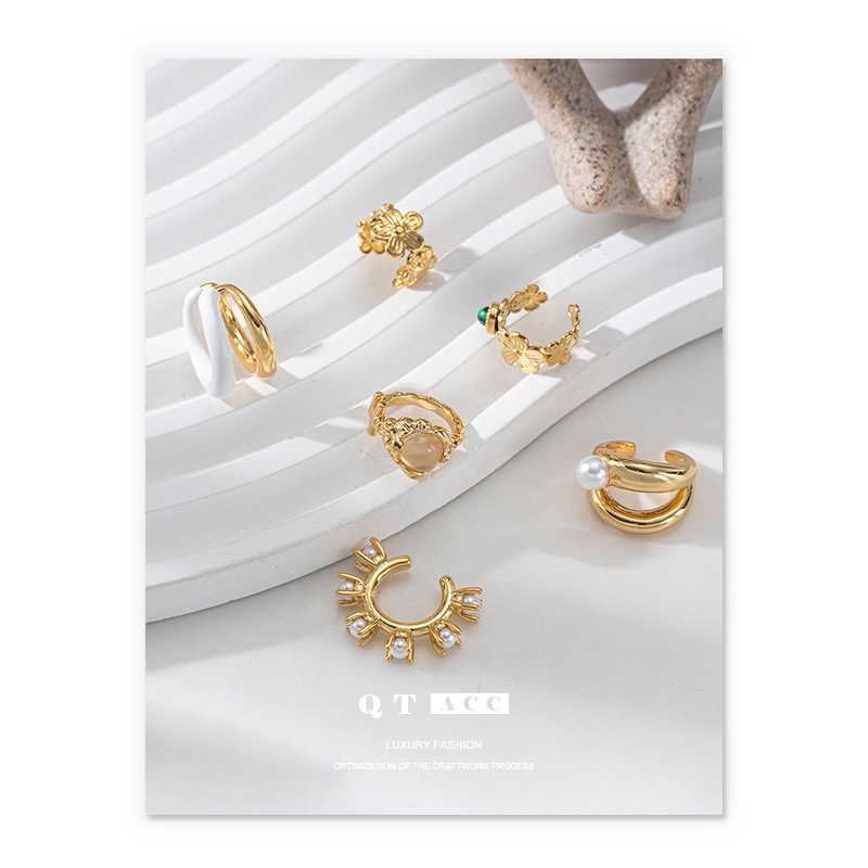 Lujo ligero, sentido de alta gama, personalidad, pendientes irregulares, temperamento, viento frío, clip de hueso de oreja, moda, todo fósforo, nuevo estilo de verano
