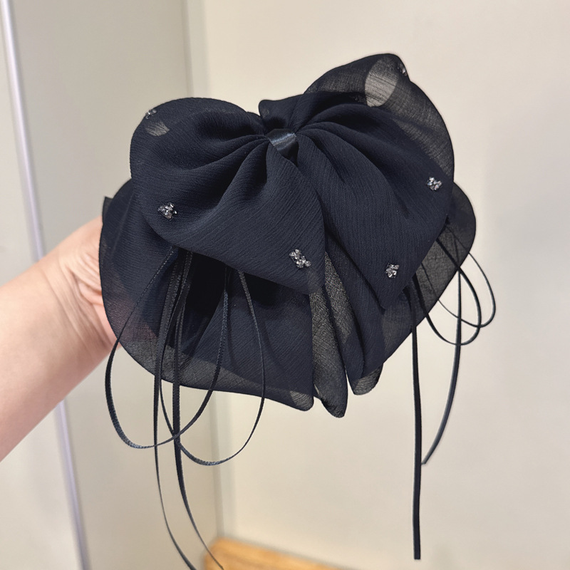 Черный хвостик с бантиком