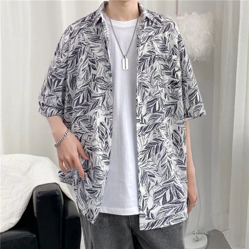 Hong Kong estilo Retro Vintage floral camisa manga corta Estilo Hawaiano tailandés diseño Ruan guapo camisa suelta para hombres y mujeres