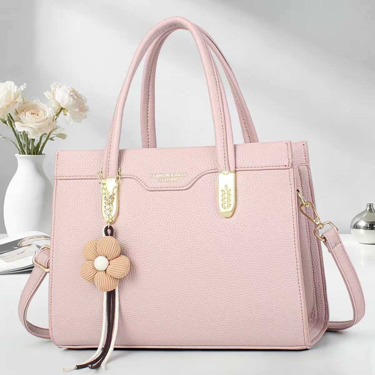 Color sólido temperamento bolso de mano flor de moda colgante bolso de hombro de gran capacidad bolsas transfronterizas
