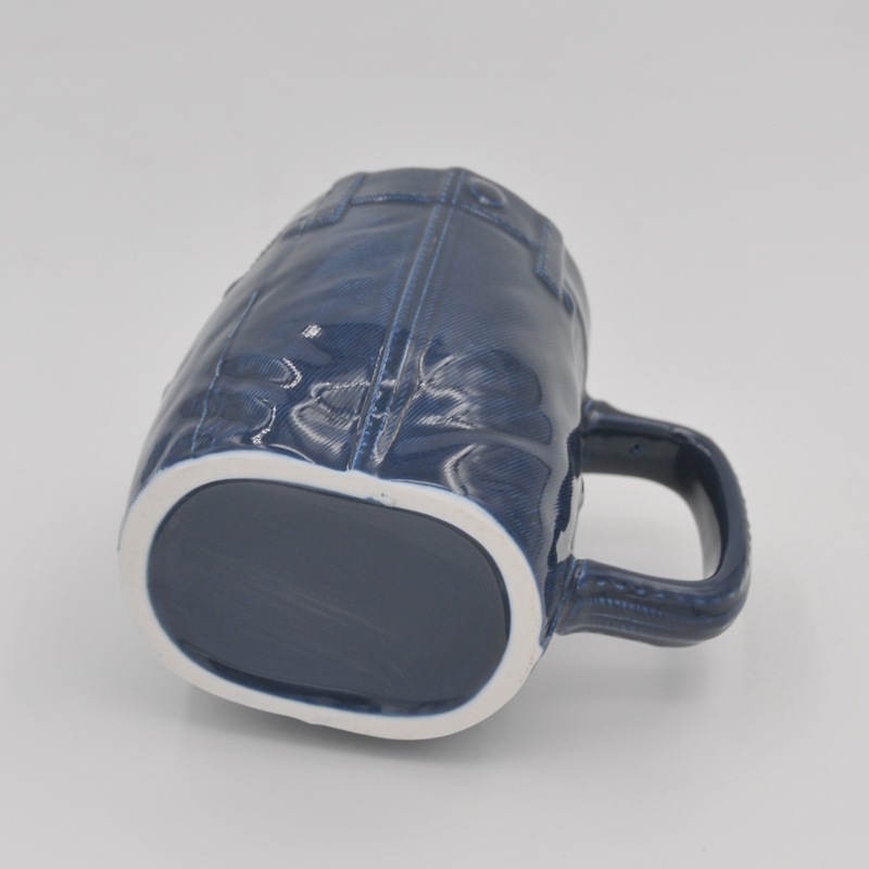 Taza de jeans de cerámica Taza de agua de mezclilla creativa con logotipo Suministro transfronterizo Taza de jeans de esmalte de color de cerámica