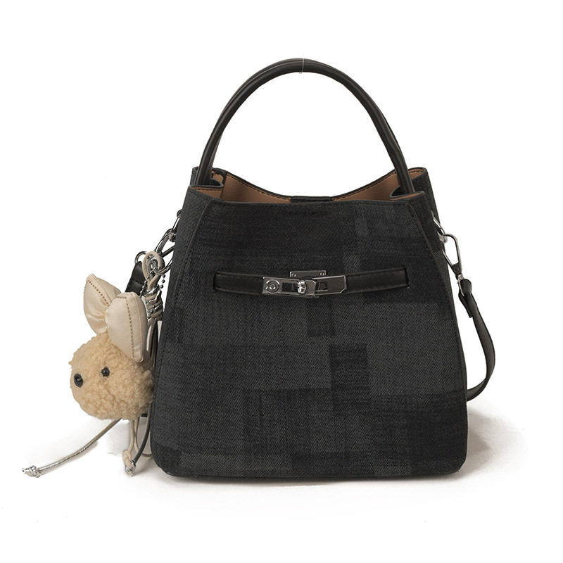 Comercio exterior transfronterizo coreano simple nicho de diseño de moda bolso de cubo para mujeres 2026 nuevo tipo de mujer mochila de hombro