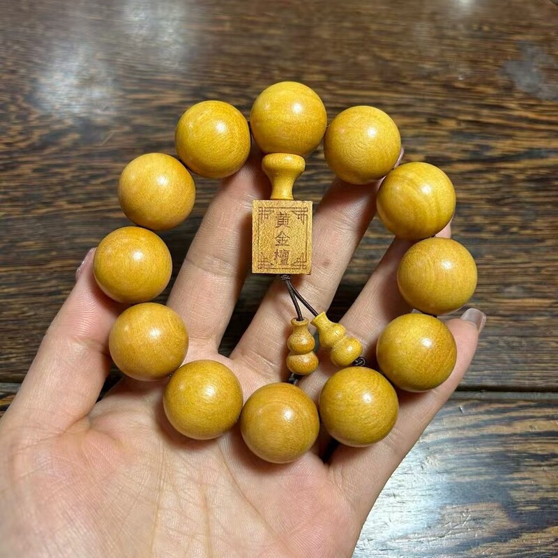 黄金檀の手串の古い材料の仏珠のメーカーはファッションのブレスレットの赤い木の文を卸売りしてアクセサリーの男女の文を遊んで遊びます。|undefined