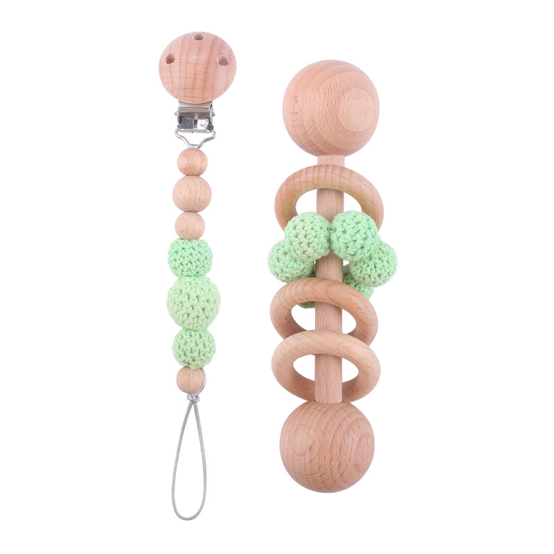 Nuevo bebé suministros Beech Rattle teether juguete calmante bebé bola de lana cuentas de madera pezón cadena traje