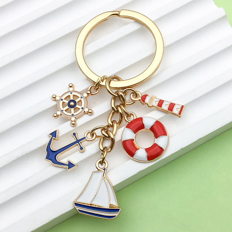 Cross-border Hot Oil Dropping Sailing Lighthouse Lifebuoy Ship Rudder Ship Anchor Keychain Pendant Creative Car Jewelry Pendant