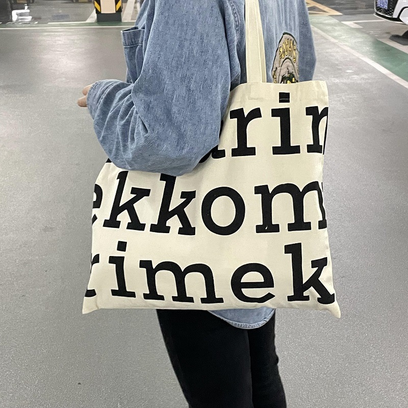 En stock bolsa de lona clase femenina estudiante universitario simple gran capacidad ins estilo coreano todo partido ulzzang bolsa de lona al por mayor