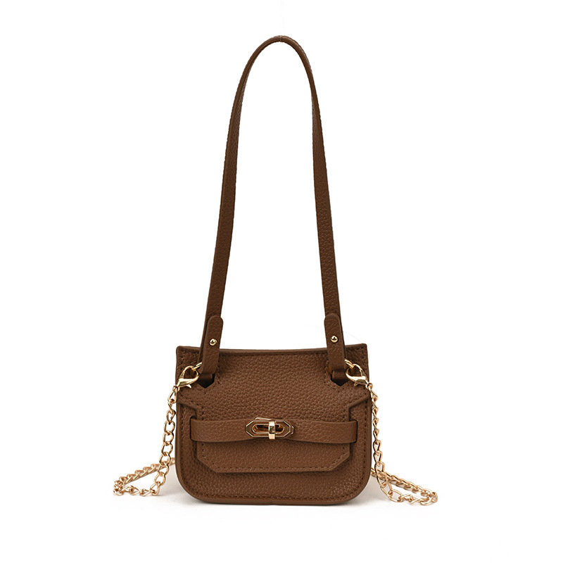 Nuevo bolso de cambio infantil coreano de moda de color sólido mini mochila de bebé comercio exterior accesorios de cadena bolsa de moda