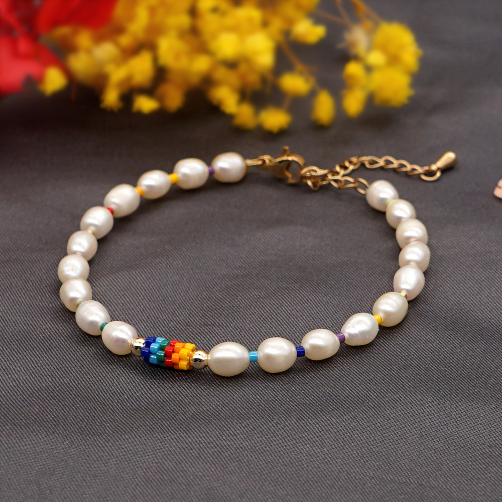 Pulsera De Perlas Con Flores Étnicas display picture 3