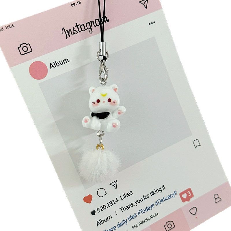 新商品の立体アニメの子猫の携帯チェーンが可愛い樹脂のキーホルダーです。