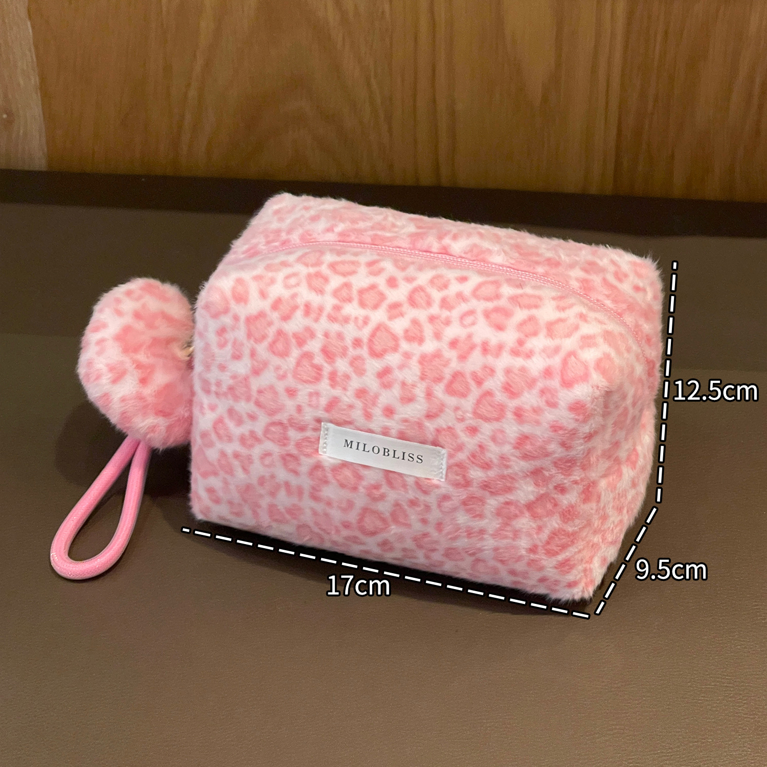 Nueva bolsa de maquillaje impresa de leopardo de peluche de pelo de conejo multifuncional portátil otoño y invierno para salir bolsa de almacenamiento de lavado de gran capacidad