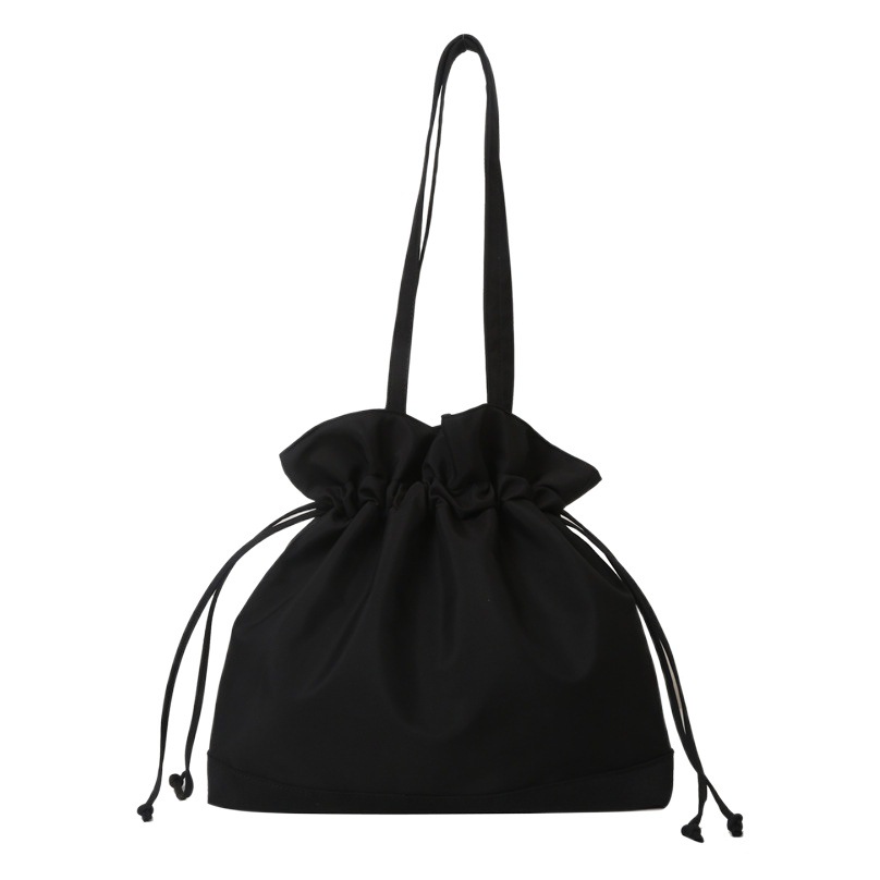 2023 nuevo estilo occidental casual color sólido Portátil Bolsa grande para las mujeres Solo bolso de hombro de invierno de moda cordón bolsa de almacenamiento de gran capacidad