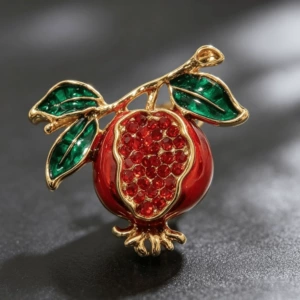 Traditional Chinese-style pomegranate brooch, exquisite enamel pin, high-end accessory for suits and coats, symbolizing abundance and good fortune, a unique and stylish piece of jewelry