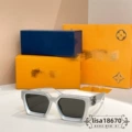 Silver frame gray lenses