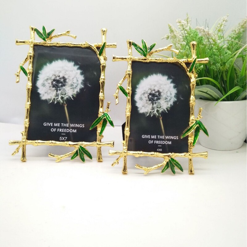Manufacturers wholesale gold branches black bamboo leaves 6 inch, 7 inch, 10 inch metal photo frame, advertising photo frame Manufacturers wholesale gold branches black bamboo leaves 6 inch, 7 inch, 10 inch metal photo frame, advertising photo frame