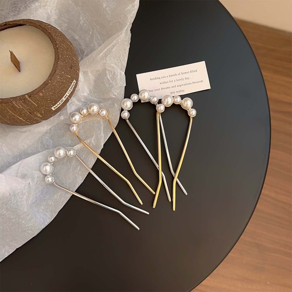 Estilo coreano moderno y simple pinzas de cabello de metal para mujeres diarias bola de cabello tipo cabeza de pinzas de cabello de perla temperamento pinzas de cabello