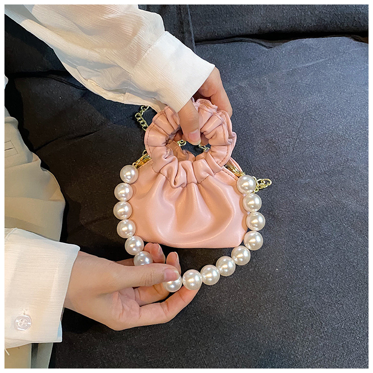 255g Weight Beading, Pearls Fashion Element Clasp Frame Closure Type Top Handle, Chain Strap Type Crossbody Bag Bags Type Casual, Daily, Shopping Occasion Pu Leather Material Solid Color Pattern All Seasons Season Kid'S Gender Cute Style Bucket Shape Kid'S Pu Leather Solid Color Cute Beading Pearls Bucket Clasp Frame Crossbody Bag 65