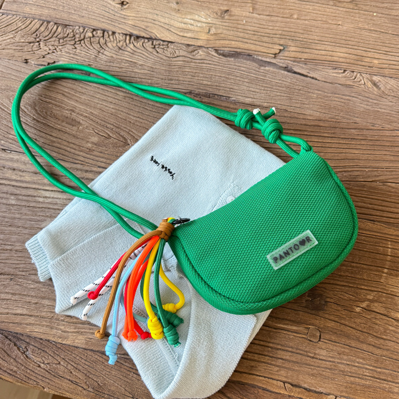 Bolso de lona de moda coreana 2025 verano nuevo bolso femenino casual estilo universitario bolso de hombro bolso de mensajero de malla hueca