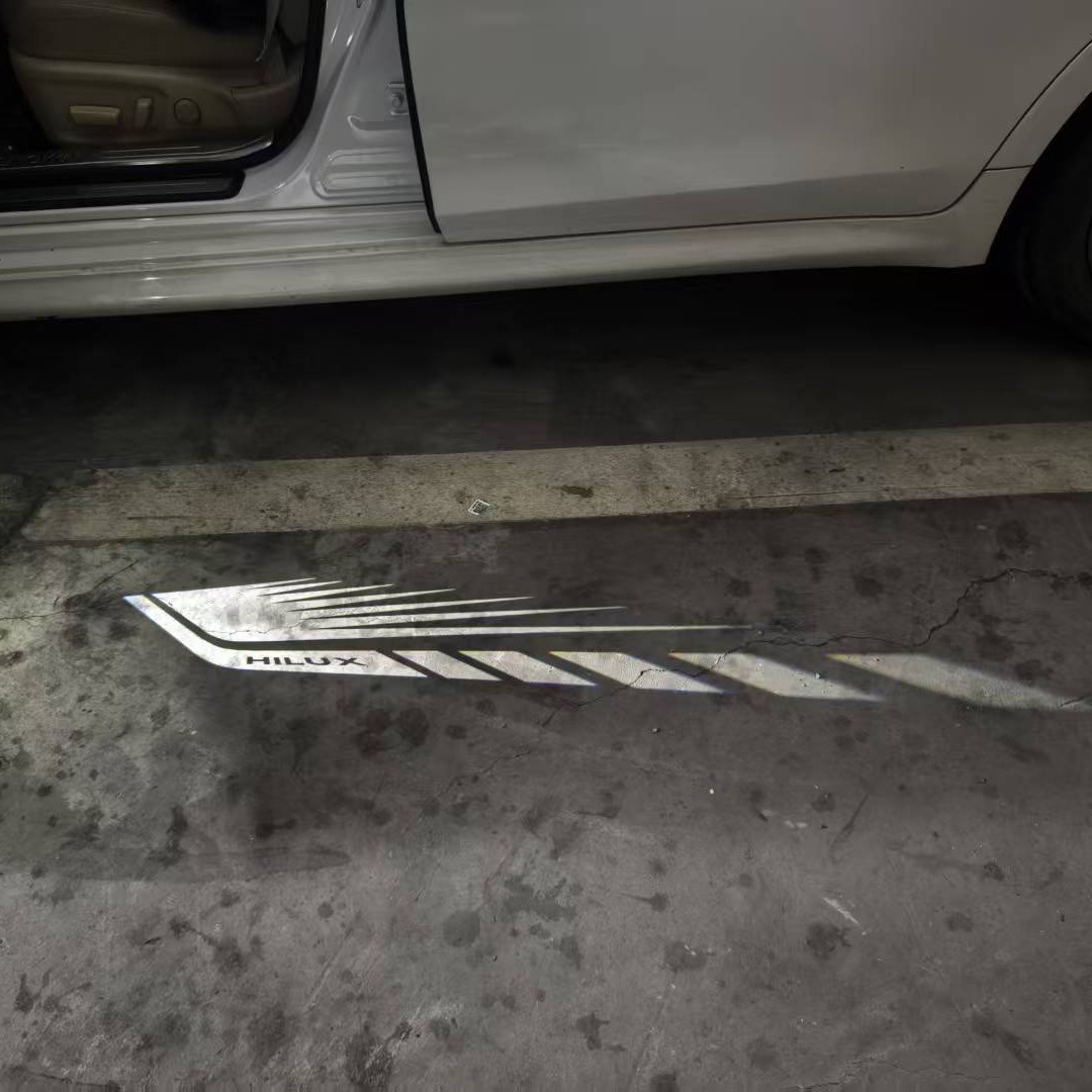 Aplicable a Toyota Hilux Hercules bienvenida lámpara de puerta de vidrio no se desvanece luz de piso de atmósfera image 2
