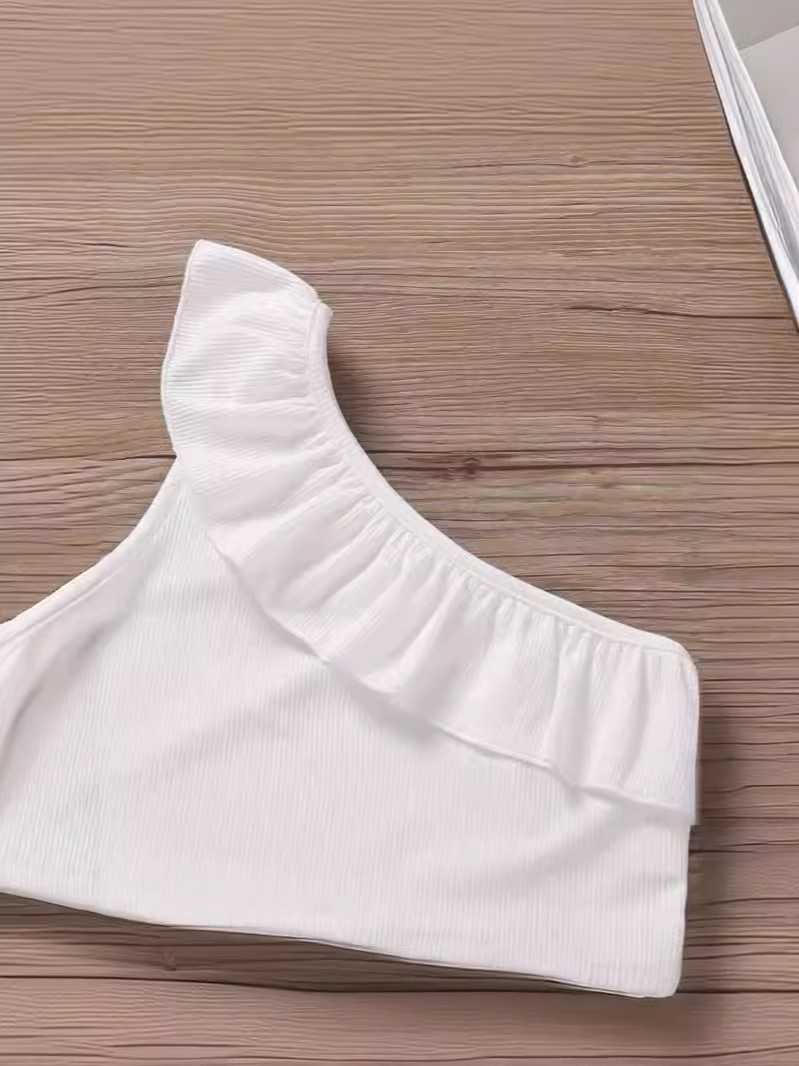 Niñas de verano bebé extranjero estilo de moda personalidad de niños coreano corto encaje hombro abierto chaleco de hombro irregular