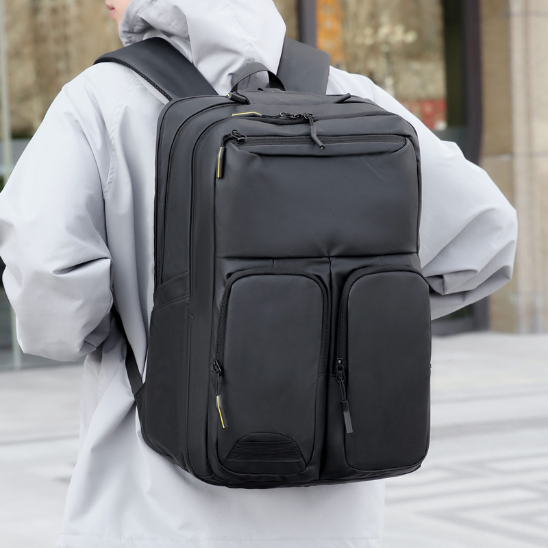 Mochila de stock de fábrica nueva bolsa de computadora de negocios de bolsillo independiente de gran capacidad bolsa de embarque de viaje de negocios portátil simple