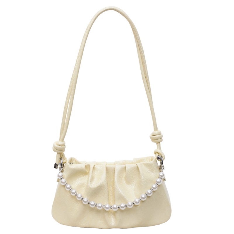 Bolsa de nube plegable de comercio exterior para mujeres 2025 nueva bolsa de brazo de aire extranjero versátil alta sensación de mochila de viaje