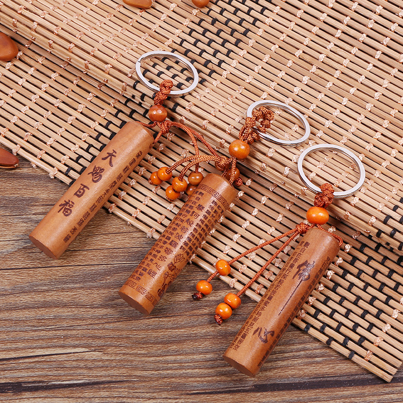 Peach wood square pillar diamond sutra keychain cylindrical heart sutra shurangama mantra key chain stall wholesale chattering live supply