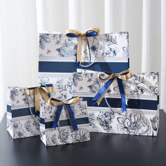 ブルー蝶結びギフトバッグ高級感誕生日お土産袋レトロ花卉紙袋クロスボーダー手提げ袋