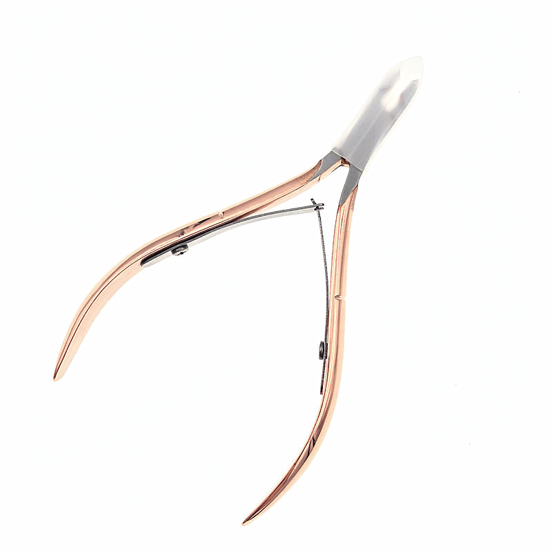 Exfoliating golden nail scissors stainless steel contains rose