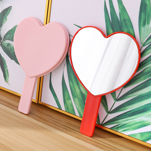 Heart-shaped mirror wholesale Korean version portable love handle mirror makeup hand-held mirror cute small mirror hand-held portable mirror