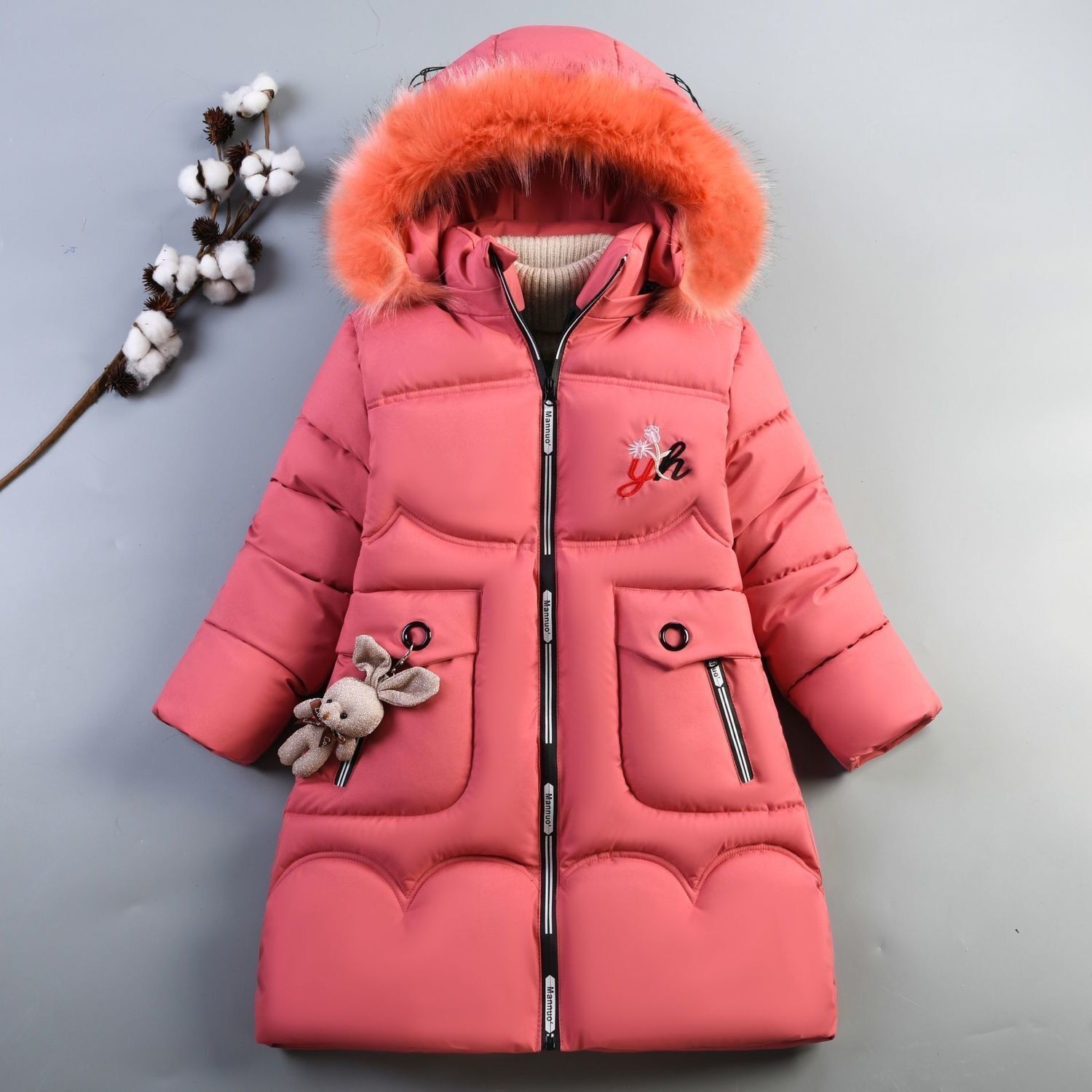 Invierno Nueva ropa de algodón acolchado para niñas de estilo coreano conejo de dibujos animados para niños de longitud media engrosada abajo ropa acolchada de algodón de moda