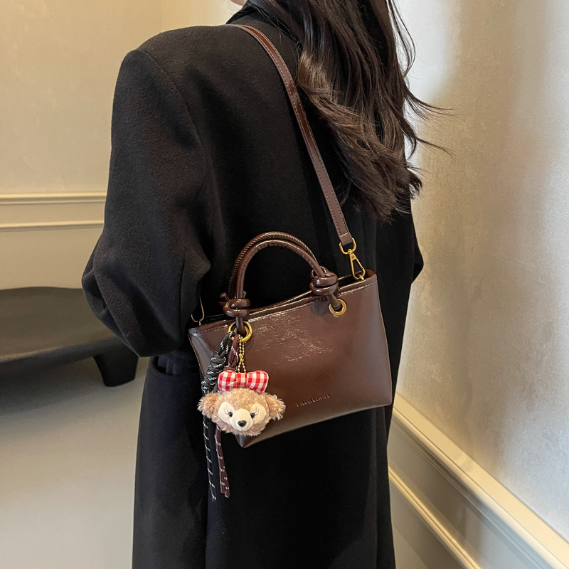 Otoño y invierno Meirad bolsos de mujer 2024 nueva moda moda bolsos de cubo de mano alta sensación de mochila versátil