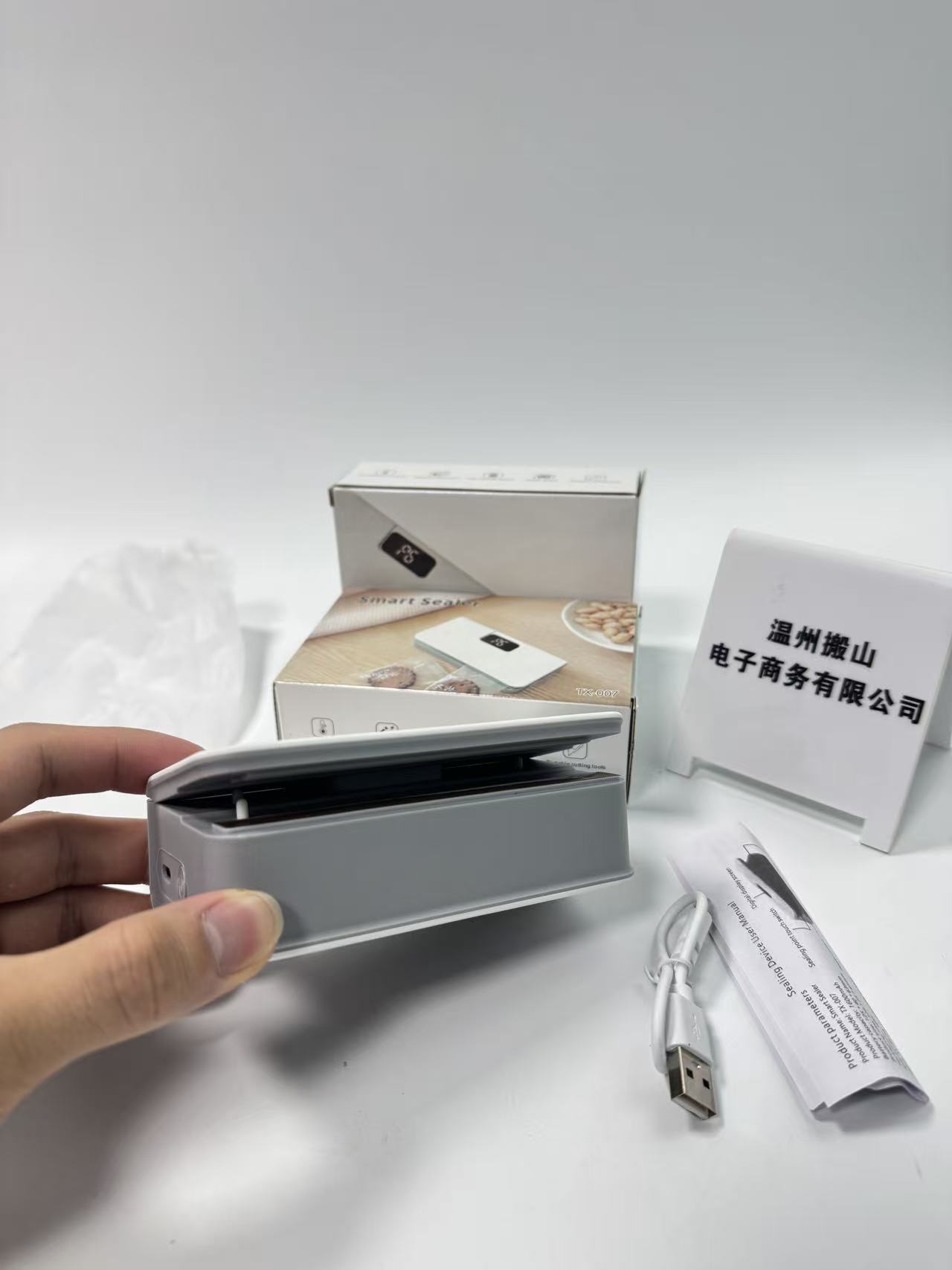Yeni Model Mini Paket Yapıştırma Makinesi Küçük Ev Tipi Isıtmalı Plastik Kapatıcı Bisküvi Taze Tutma Otomatik Mühür Ev Tipi Çok Seviyeli Ayarlanabilir