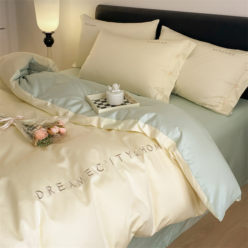 Cama de algodón cuatro piezas estudiantes tres piezas cubierta de edredón bordado de algodón sábanas caseras ropa de cama impresión y teñido activo