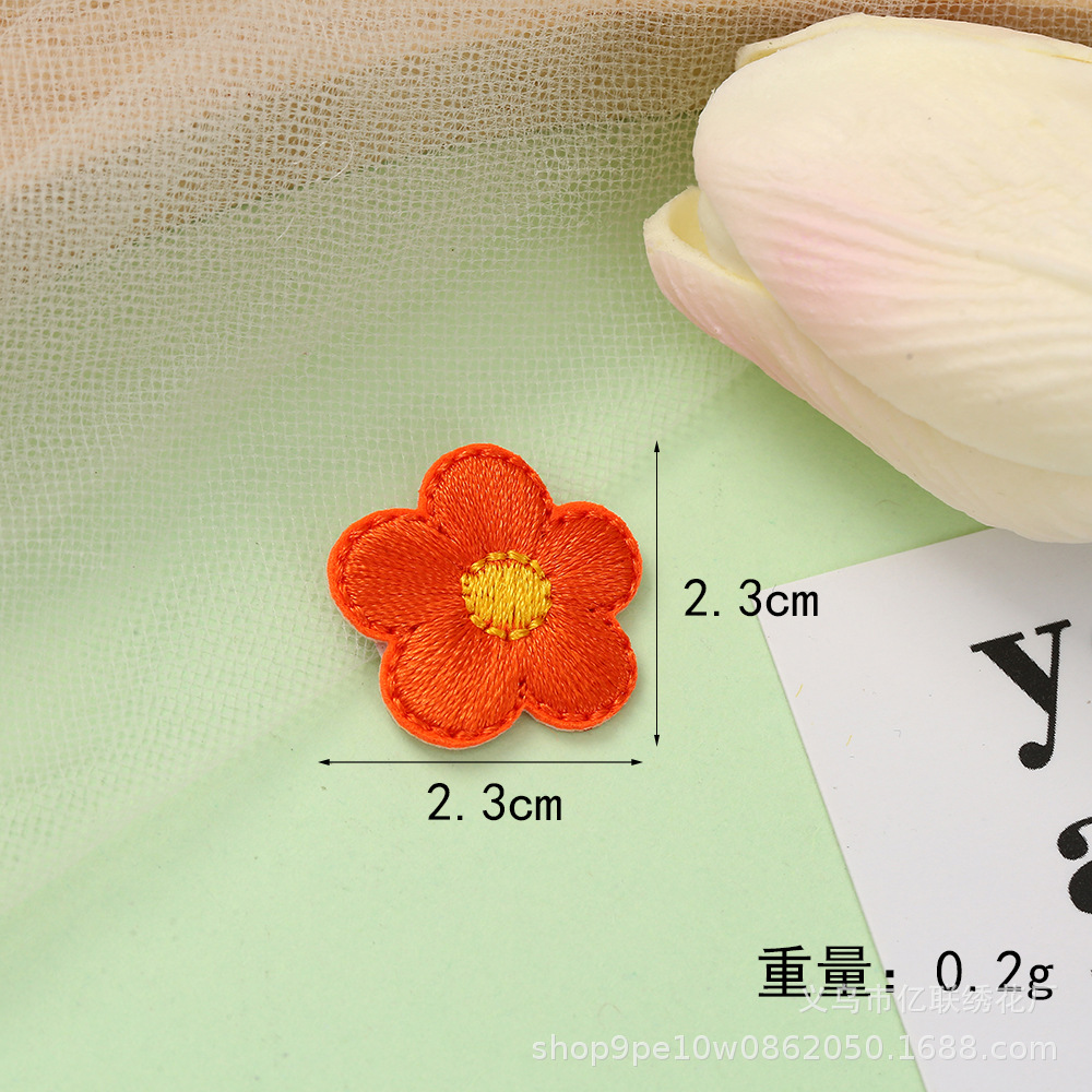 新しい花の布はホットメルトの服の補助材料を貼って国境を越えて商品を供給します。
