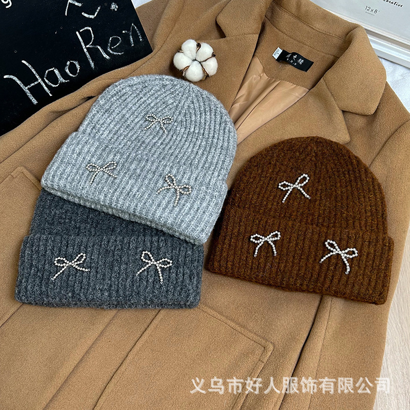 韓国版のファッションの新型の小さい香風の真珠の蝶結びの毛糸の帽子の大きい頭の周りの耳のメリヤスの冷たい帽子の頭の帽子の潮|undefined