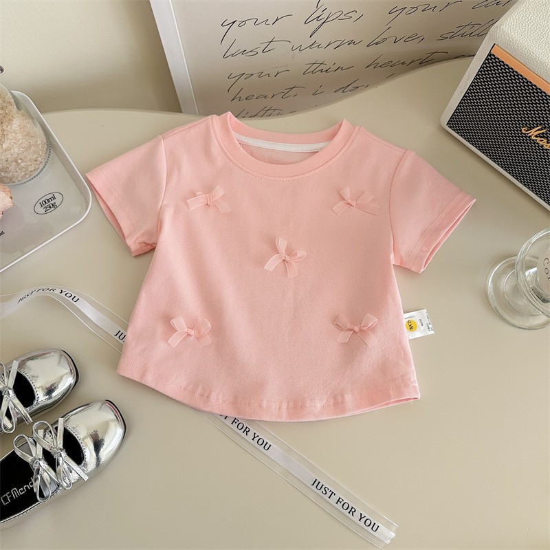 Tongxingyuan 2025 Camiseta de Verano para Niñas Estilo Coreano de Manga Corta, Camisa con Ribete de Encaje Rosa Dulce y Elegante para Bebés.